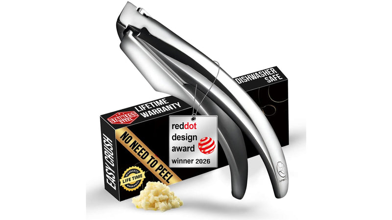 The Gourmet Easy garlic press with its gift box and a design award tag