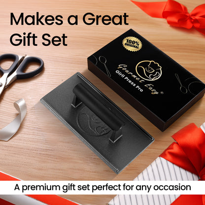Cast Iron Grill Press presented in a black gift box with ribbon