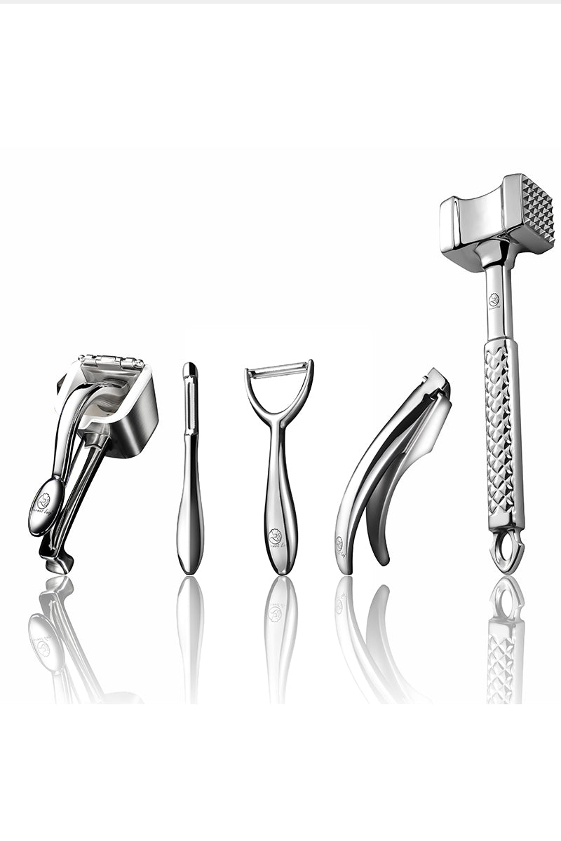 The Gourmet Easy Ultimate Gourmet Pro Kit: the handheld Juicer, the I Peeler, the Y Peeler, the Garlic Easy press and the two-sided Meat Tenderizer